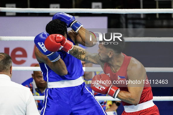 Eumir Felix Marcial of the Philippines competes against Maikhel Roberrd Muskita of Indonesia during the Men's light heavyweight 80kg finals... by Anusak Laowilas/NurPhoto