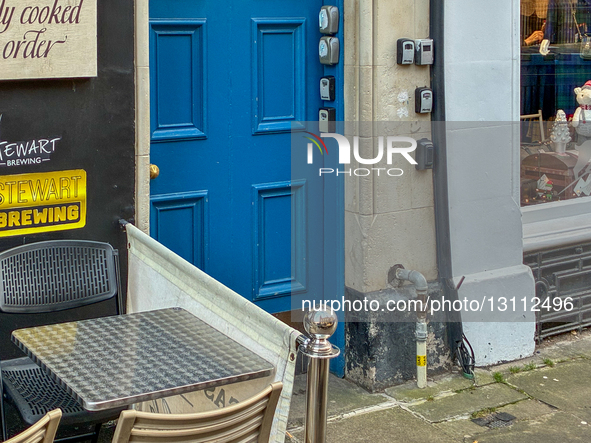 Multiple combination key boxes used for guest access to Airbnb, Booking.com, and other short-term rental apartments are attached to the door... by Michael Nguyen/NurPhoto