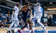 NATE GUERENGOMBA (9) of the Quinnipiac Bobcats gets a rebound during an NCAA men's basketb...