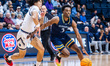 ASIM JONES (3) of the Quinnipiac Bobcats drives the ball during an NCAA men's basketball g...