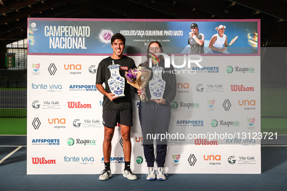 Tiago Torres and Francisca Jorge of Portugal, the Portuguese National Tennis Champions, pose together with their trophies at Clube de Tenis... by Miguel Reis/NurPhoto