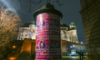 KRAKOW, POLAND – DECEMBER 22:A typical advertising pillar is seen in front of Wawel Castl...