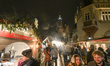 KRAKOW, POLAND – DECEMBER 22:A crowd of tourists and locals fills the Christmas market in...