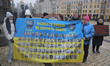 Activists hold a banner in Sofiiska Square during the ''Don't Be Silent! Captivity Kills''...