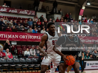 Nadjrick Peat of Coastal Carolina University plays against Saint Joseph's University as the two teams face off for the first time in Philade... by Nathan Morris/NurPhoto