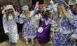 Members of the Russian community in Mexico City, Mexico, on December 23, 2025, parade thro...