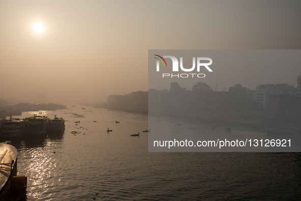 Fewer boats are seen on the river than on other days due to dense fog in Dhaka, Bangladesh, on December 24, 2025.  by Md. Rakibul Hasan Rafiu/NurPhoto