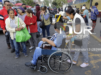 Families in Mexico City, Mexico, on December 24, 2025, distribute meals outside the Dr. Eduardo Liceaga General Hospital to families awaitin... by Gerardo Vieyra/NurPhoto