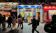 People dine, drink, and shop outdoors in London's Chinatown in the City of Westminster, En...