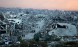 A general view shows destroyed houses in Nuseirat camp in the central Gaza Strip on Decemb...