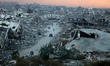 A general view shows destroyed houses in Nuseirat camp in the central Gaza Strip on Decemb...