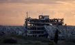 A general view shows destroyed houses in Nuseirat camp in the central Gaza Strip on Decemb...