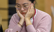 Song Yuxin of China competes against Nino Batsiashvili of Georgia during the women's rapid...