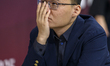 Yu Yangyi of China reacts while playing against Sandipan Chanda of India during the Rapid...