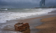 The Barcelona coastline is affected by a maritime storm, causing large waves, making parts...
