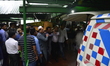 Relatives and friends carry the bodies of two Bangladeshi victims of the attack on Holey A...