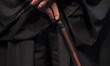 An Iranian actor holds a magic wand after playing the role of Harry Potter in the play ''H...