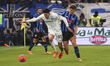 Alessandro Bastoni and Charles De Ketelaere play during the Serie A match between Atalanta...
