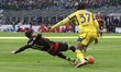 Christian Pulisic and Armel Bella-Kotchap play during the Serie A match between AC Milan a...