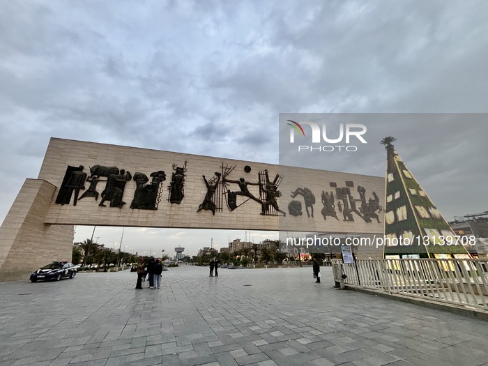 A Christmas Tree Illuminates Tahrir Square In Baghdad.