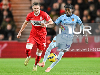 Luke Ayling of Middlesbrough FC and Joel Ndala of Hull City participate in the Sky Bet Championship match between Middlesbrough and Hull Cit... by MI News/NurPhoto