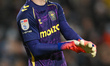 Carl Rushworth, the goalkeeper of Coventry City, adjusts his gloves during the Sky Bet Cha...