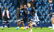Koki Saito, 14, of Queens Park Rangers warms up during the Sky Bet Championship match betw...
