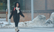 A woman walks on a frigid winter morning in Toronto, Ontario, Canada, on December 30, 2025...