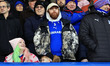 A general view of an Oldham fan at Boundary Park during the Sky Bet League 2 match between...