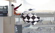 The chequered flag waved, the iconic black and white checkered flag waved to signal the en...