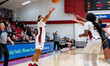 Aliya McIver of the Rider Broncs attempts a three-point field goal during an NCAA women's...