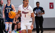 Aliya McIver of the Rider Broncs drives the ball during an NCAA women's basketball game at...