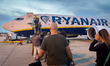Passengers board a Ryanair Boeing 737 MAX 8 (EI-IGY) aircraft via mobile stairs at Paphos...