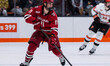 JUSTIN SOLOVEY (11) of the Harvard Crimson possesses the puck during an NCAA men's ice hoc...