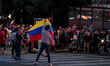 Members of the Venezuelan community celebrate at the Obelisk in Buenos Aires, Argentina, o...