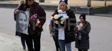 Gallery cover photo: Mother Of Ashli Babbitt Lays Flowers At Capitol