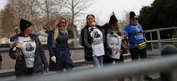 Gallery cover photo: Mother Of Ashli Babbitt Lays Flowers At Capitol