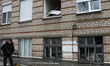 Broken windows in a multi-storey residential building are seen following a Russian drone a...