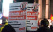 More than two hundred people take part in the ''Hands off Venezuela'' protest against Amer...