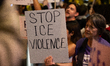 Protesters gather at the intersection of Post Oak Blvd and Westheimer Rd in Houston, Texas...