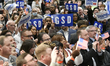 People in attendance listen as Gov. Josh Shapiro speaks during a re-election campaign laun...