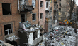 Municipal workers clear damage following Russian ballistic missile strikes in one of the r...