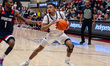 KHAAFIQ MYERS (3) of the St. Joseph's Hawks possesses the ball during an NCAA men's basket...