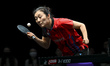 Ying Han of Germany competes against Wang Manyu of China during a women's singles quarter-...