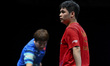 Lin Shidong of China competes against Liang Jingkun of China during a men's singles quarte...