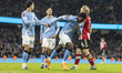 Ryan McAidoo #56 of Manchester City F.C. celebrates his goal during the Emirates FA Cup Th...
