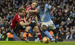 Jeremy Doku #11 of Manchester City F.C. goes past the opponent during the Emirates FA Cup...