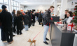 People are waiting in a line to adopt a dog during 'Operation Frost' launched by KTOZ Shel...