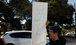Hundreds protest against ICE outside of Austin City Hall in Austin, Texas, on January 10,...