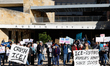 Hundreds protest against ICE outside of Austin City Hall in Austin, Texas, on January 10,...